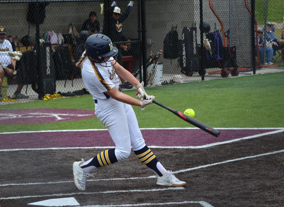 Hartland freshman Kaitlyn Brennan takes a swing during a 7-6 victory over host Kalamazoo Central in a regional semifinal softball game Saturday, June 8, 2024.