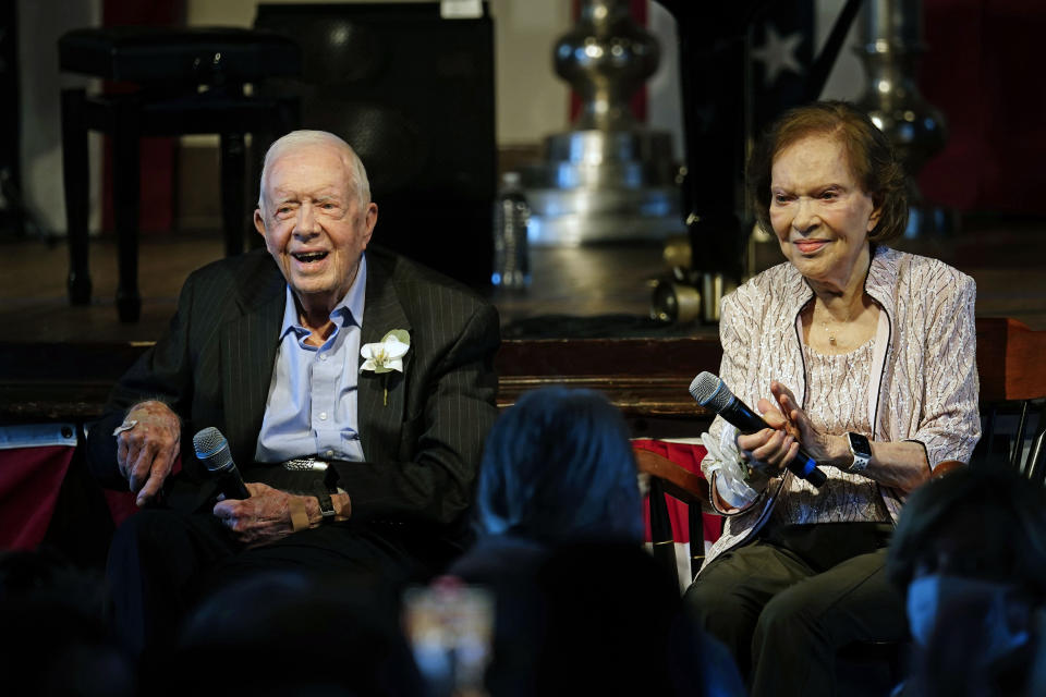 FILE - Former President Jimmy Carter and his wife former first lady Rosalynn Carter sit together during a reception to celebrate their 75th wedding anniversary Saturday, July 10, 2021, in Plains, Ga. Jimmy and Rosalynn are celebrating their 77th wedding anniversary, Friday, July 7, 2023. (AP Photo/John Bazemore, Pool, File)