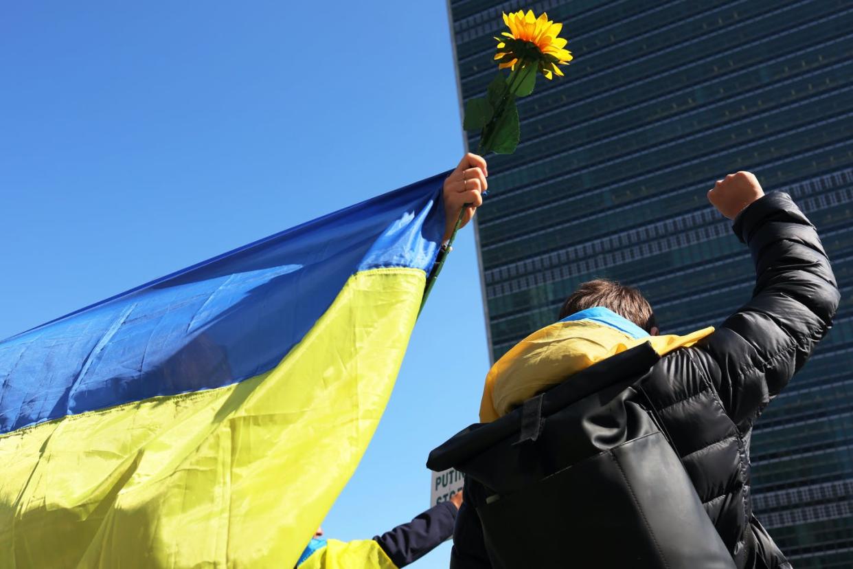 <span class="caption">People gather outside the U.N. headquarters in New York City to protest the war in Ukraine on March 2, 2022.</span> <span class="attribution"><a class="link " href="https://media.gettyimages.com/photos/people-gather-to-protest-the-war-in-ukraine-in-front-of-the-united-picture-id1376528255?s=2048x2048" rel="nofollow noopener" target="_blank" data-ylk="slk:Michael M. Santiago/Getty Images;elm:context_link;itc:0;sec:content-canvas">Michael M. Santiago/Getty Images</a></span>