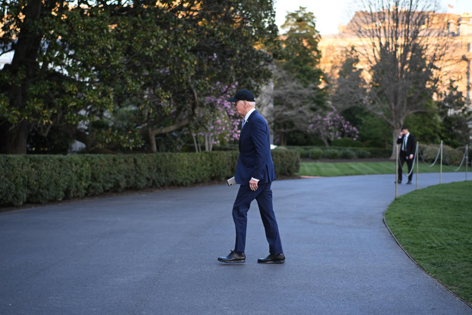 US President Joe Biden walks across the South Lawn upon return to the White House in Washington, DC on March 21, 2023. Biden returned from a three-day campaign trip in Nevada, Arizona and Texas. (Photo by Mandel NGAN / AFP) (Photo by MANDEL NGAN/AFP via Getty Images)