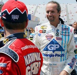 Kyle Petty (right) jokes with Greg Biffle following practice last week at New Hampshire International Speedway in Loudon, N.H. Jim Cole | Associated Press