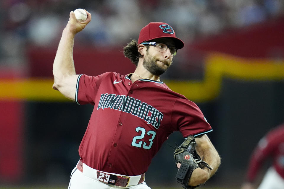 Arizona Diamondbacks starting pitcher Zac Gallen throws against the St. Louis Cardinals during the first inning of a baseball game, Sunday, April 14, 2024, in Phoenix. (AP Photo/Ross D. Franklin)