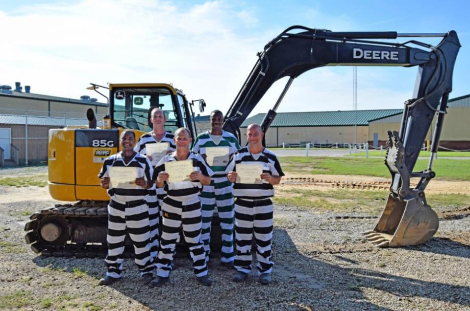 Inmates at the Walton County Jail who volunteered to help clean up after the storm