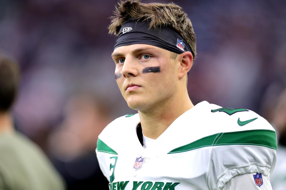 HOUSTON, TEXAS - NOVEMBER 28: Zach Wilson #2 of the New York Jets looks on before the game against the Houston Texans at NRG Stadium on November 28, 2021 in Houston, Texas. (Photo by Carmen Mandato/Getty Images)