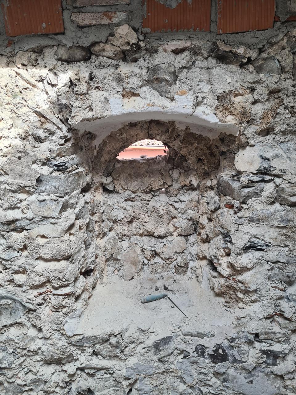 A medieval window in a house in Italy.