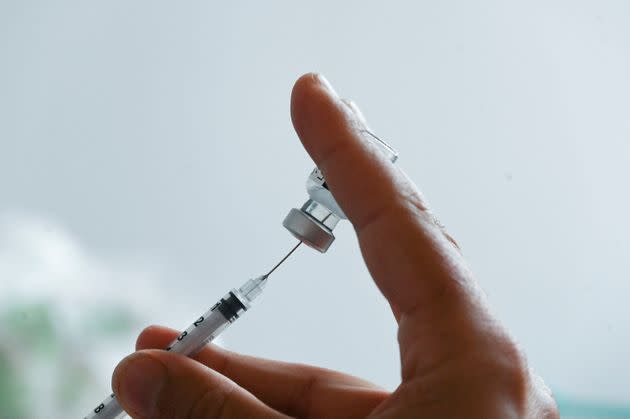 A doctor prepares a dose of the Pfizer/BioNTech Covid-19  (Photo by DENIS CHARLET / AFP) (Photo by DENIS CHARLET/AFP via Getty Images) (Photo: DENIS CHARLET via Getty Images)