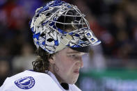 Tampa Bay Lightning goaltender Andrei Vasilevskiy reacts during a break in play against the New Jersey Devils during the second period of an NHL hockey game Tuesday, March 14, 2023, in Newark, N.J. (AP Photo/Adam Hunger)