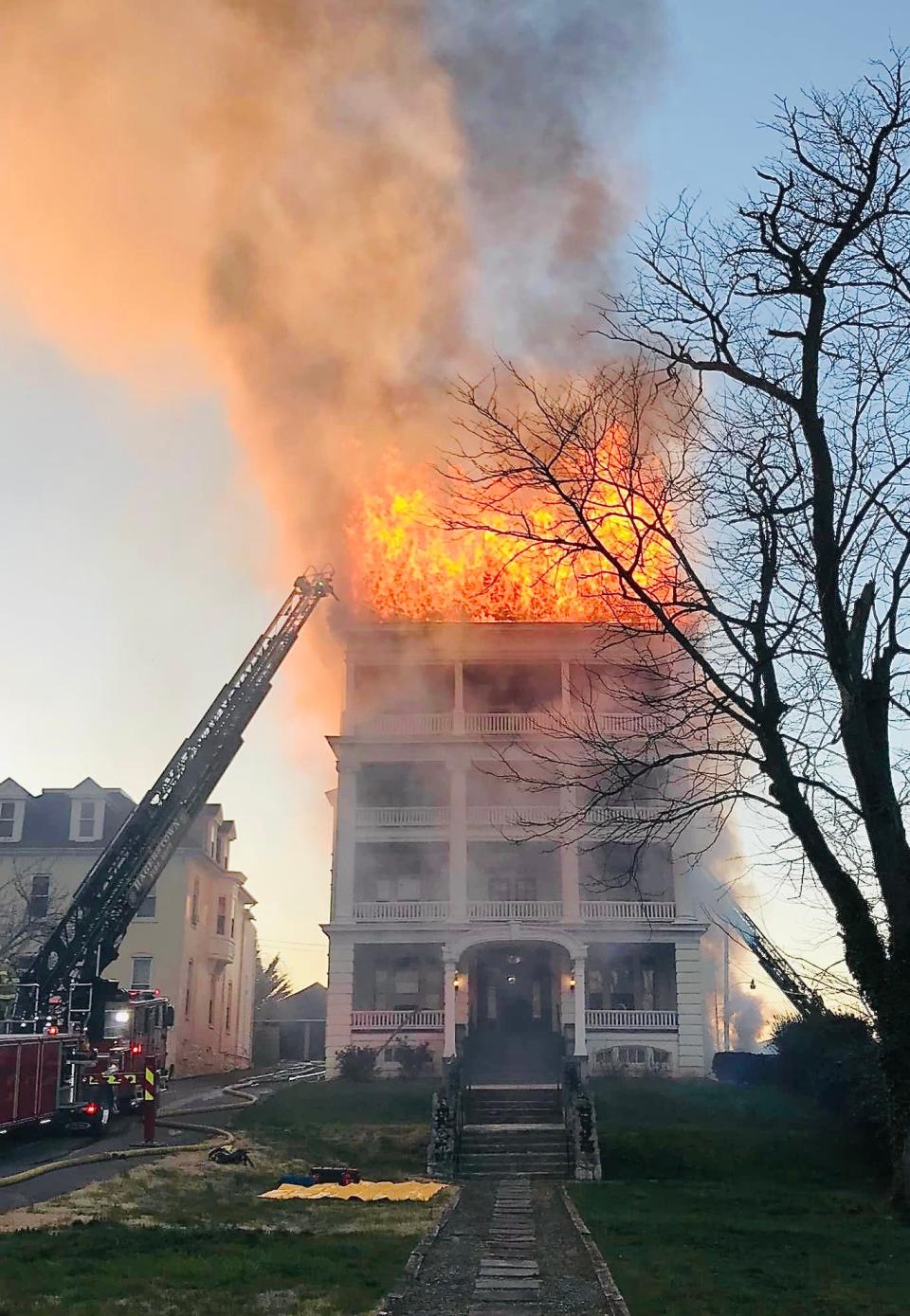 Flames shoot Thursday evening from the top level of the Mount Royal Apartments building on Oak Hill Avenue in Hagerstown.