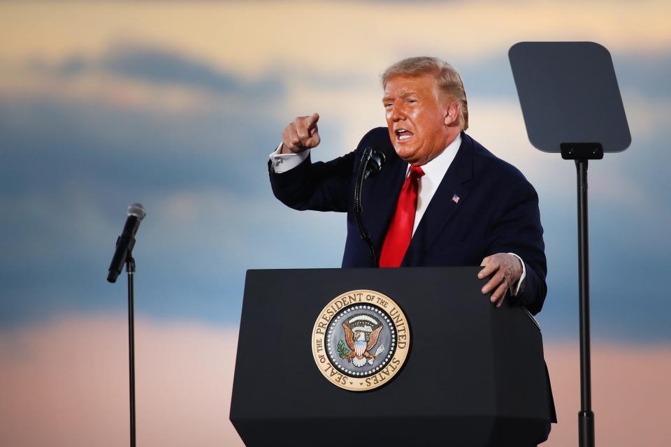 President Donald Trump speaks a rally at an airport hanger in Londonderry, New Hampshire, Aug. 28, 2020.