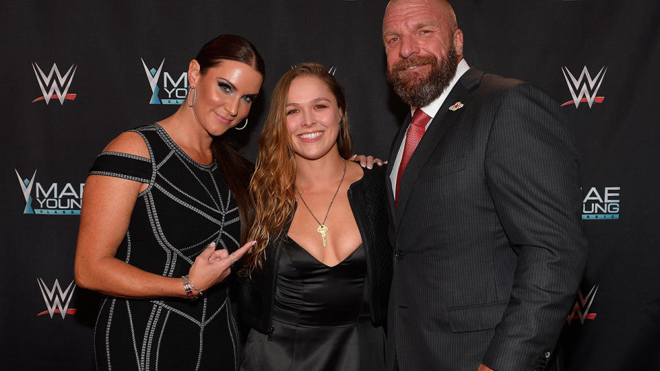 Ronda Rousey, pictured here with Stephanie McMahon and Paul 'Triple H' Levesque in 2017.