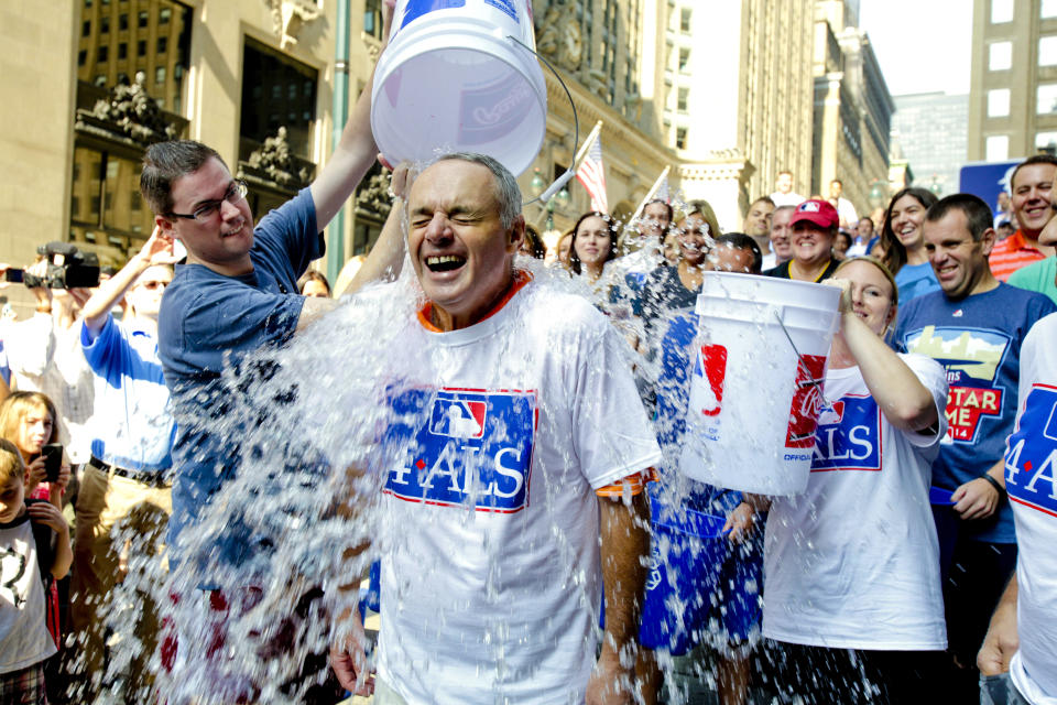 Major League Baseball Commissioner-elect Rob Manfred participates in the ALS Ice-Bucket Challenge outside the organization's headquarters in New York, Aug. 20, 2014. (Vanessa A. Alvarez/AP)