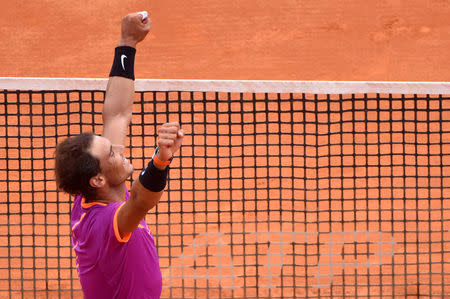 Tennis - Monte Carlo Masters - Monaco, 23/04/2017. Rafael Nadal of Spain reacts after defeating his compatriot Albert Ramos-Vinolas in the final of the Monte Carlo Masters. REUTERS/Jean-Pierre Amet