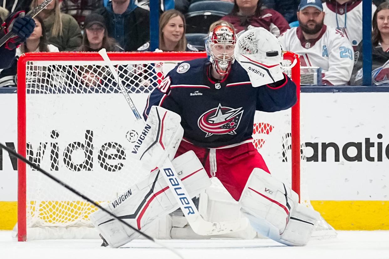 Apr 1, 2024; Columbus, Ohio, USA; Columbus Blue Jackets goaltender Daniil Tarasov (40) makes a glove save during the third period of the NHL hockey game against the Colorado Avalanche at Nationwide Arena. The Blue Jackets won 4-1.