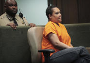 Sherra Wright listens to details of her plea deal during a hearing in Judge Lee Coffee's court in Memphis, Tenn., on Thursday, July 25, 2019 where she plead guilty to the first degree murder of her husband, former NBA player Lorenzen Wright. (Jim Weber/Daily Memphian via AP)