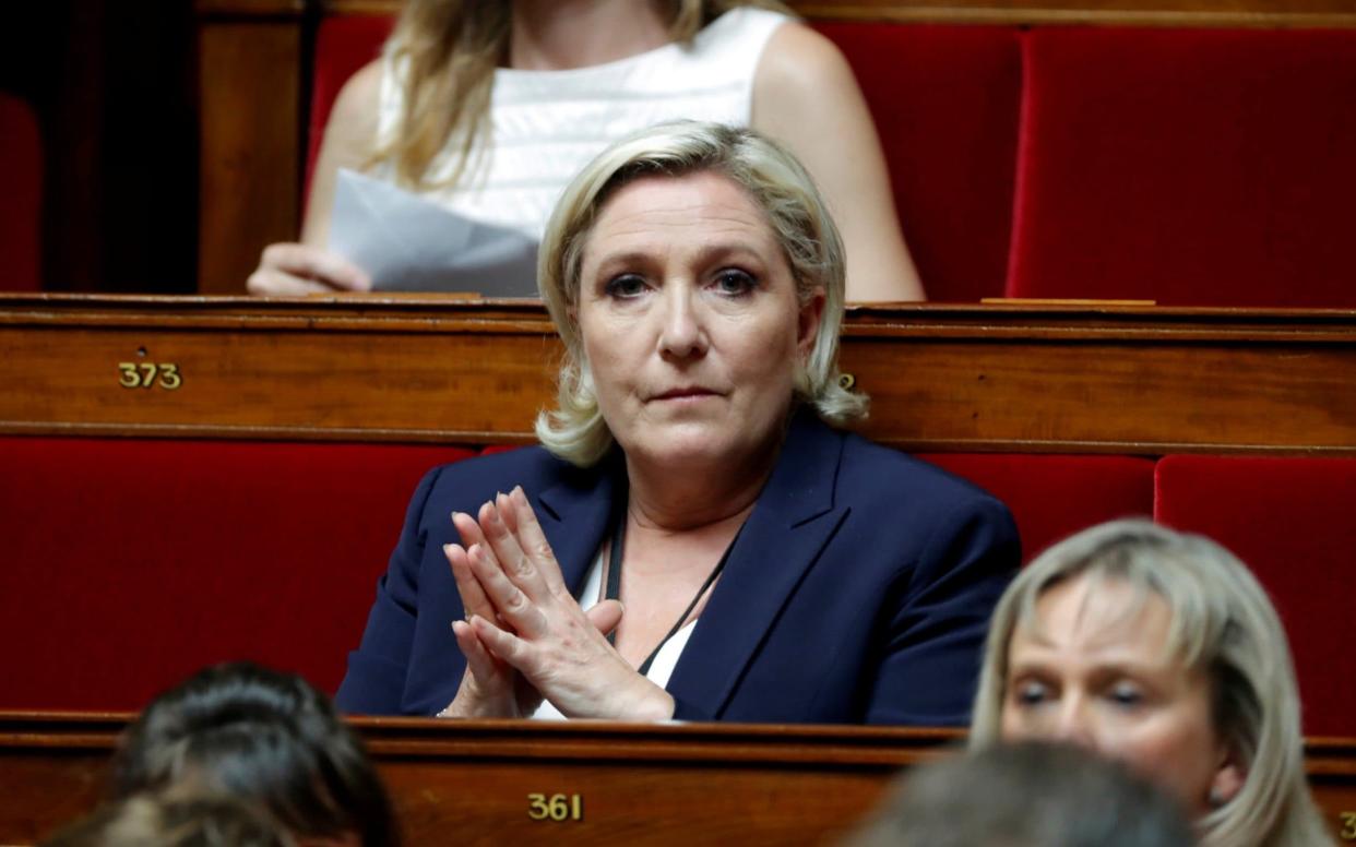 Marine Le Pen's National Rally party is seen as the main opposition force in next year's presidential elections - Charles Platiau /Reuters