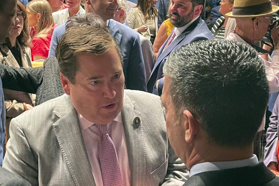 Louisiana Lt. Gov. Billy Nungesser talks with Michael Hecht, a coordinator of the state's preparations for next year's Super Bowl, a news conference at the Saenger Theater in New Orleans, Tuesday, June 4, 2024, about the city's preparations for hosting NFL football's Super Bowl. (AP Photo/Kevin McGill)