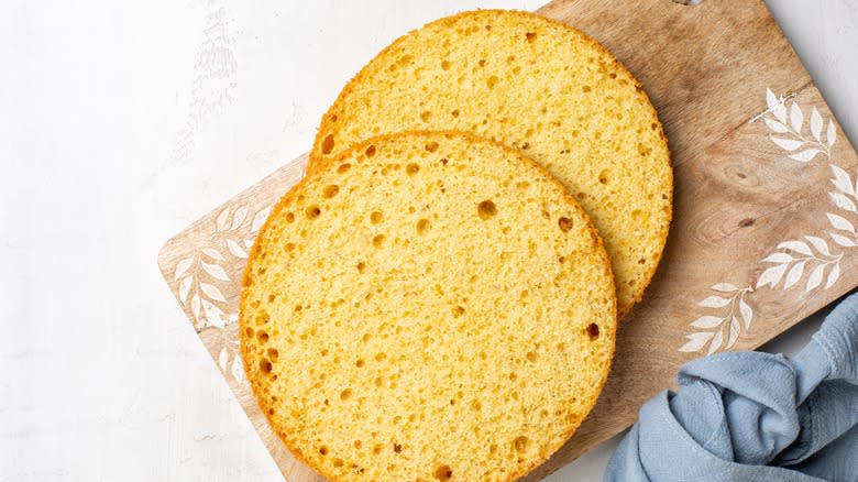 yellow cake layers on cutting board