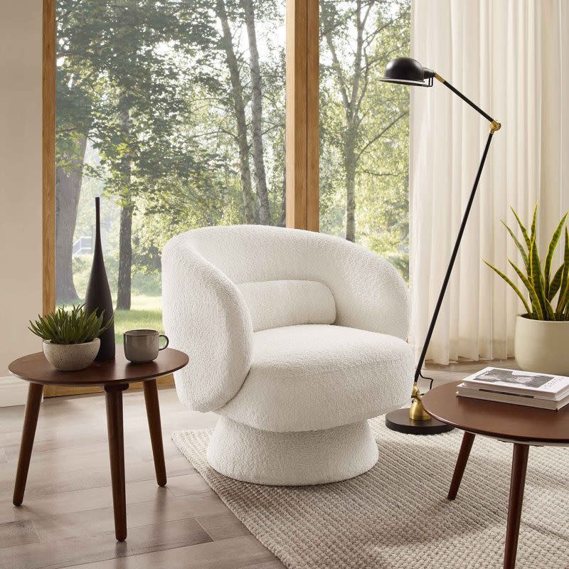 <p><a href="https://go.redirectingat.com?id=74968X1596630&url=https%3A%2F%2Fwww.wayfair.com%2F--%2Fpdp%2Forren-ellis--minimore-wool-swivel-accent-chair-sherpa-wool-surfece-barrel-chair-x118546621-l54-w007435510.html&sref=https%3A%2F%2F" rel="nofollow noopener" target="_blank" data-ylk="slk:Shop Now;elm:context_link;itc:0;sec:content-canvas" class="link ">Shop Now</a></p><p>Minimore Sherpa Swivel Accent Chair</p><p>wayfair.com</p><p>$258.00</p>