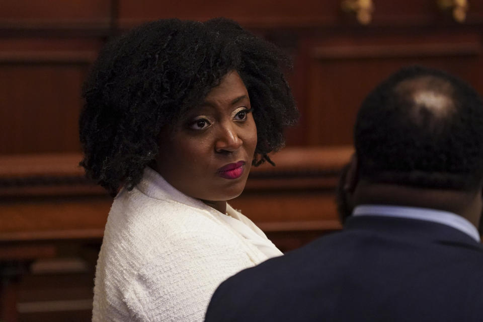 Democratic floor leader Rep. Joanna McClinton stands on the floor as legislators of the Pennsylvania House of Representatives are sworn-in, Tuesday, Jan. 3, 2023, at the state Capitol in Harrisburg, Pa. The ceremony marks the convening of the 2023-2024 legislative session of the General Assembly of Pennsylvania. (AP Photo/Matt Smith)