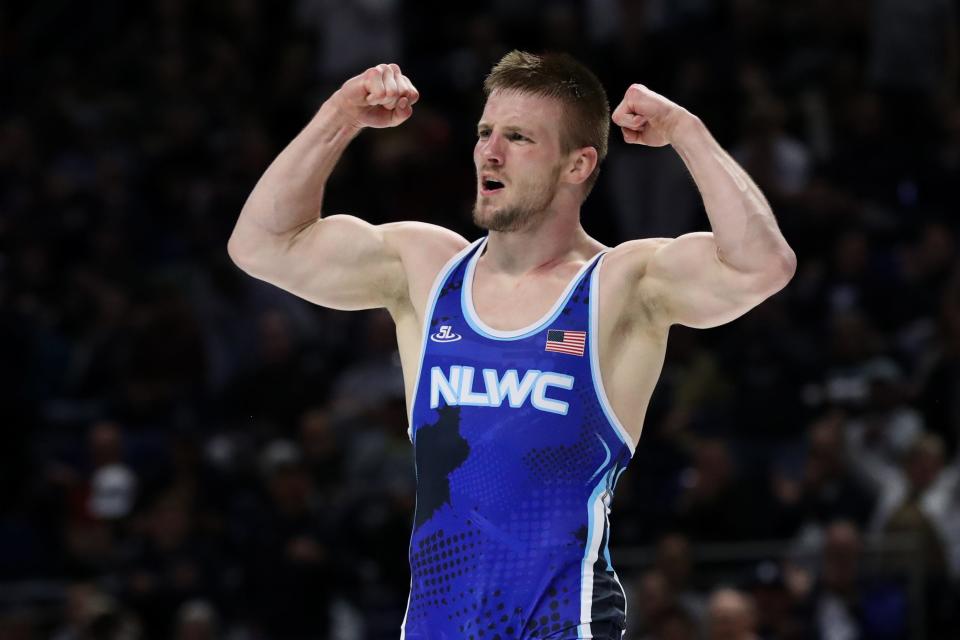 Jason Nolf reacts after winning by default 3-0 over Jordan Burroughs in a 74-kilogram challenger tournament final match during the U.S. Olympic Wrestling Team Trials.