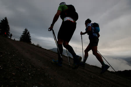Competitors run in the Col de Voza during the 16th Ultra-Trail du Mont-Blanc (UTMB) race near Chamonix, France August 31, 2018. REUTERS/Denis Balibouse