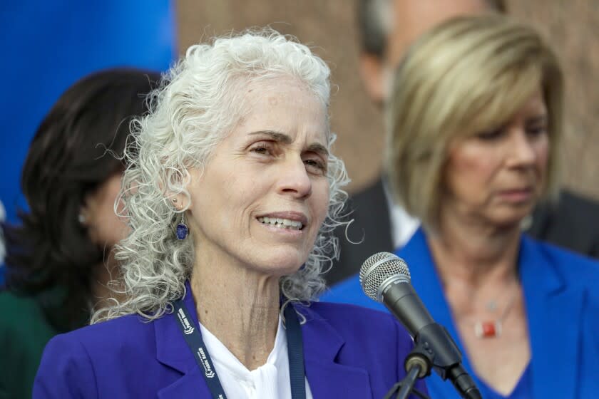 LOS ANGELES, CA - MARCH 04 , 2020 - L.A. County Department of Public Health Director Barbara Ferrer addresses a press conference held at the steps of Kenneth Hahn Hall of Administration to declare a health emergency as the number of coronavirus cases increased to seven, with six new cases in Los Angeles County. None of the new cases are connected to "community spread," officials said. All individuals were exposed to COVID-19 through close contacts. The additional cases were confirmed Tuesday night. Officials said three of the new cases were travelers who had visited northern Italy, two were family members who had close contact with someone outside of the county who was infected, and one had a job that put them in contact with travelers. One person has been hospitalized, and the others are isolated at home. (Irfan Khan / Los Angeles Times)