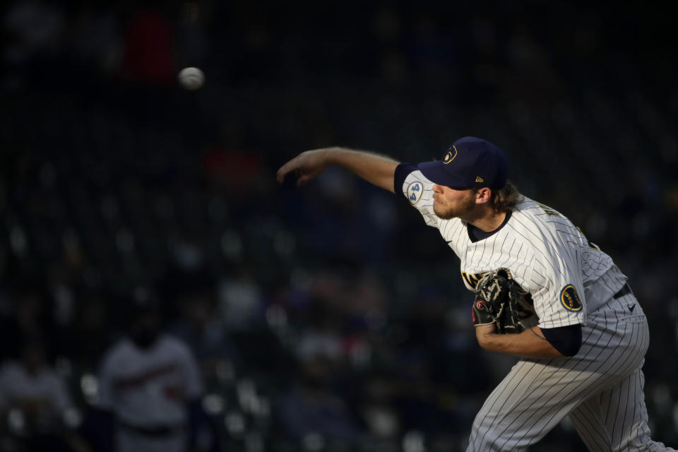 Milwaukee Brewers' Corbin Burnes pitches during the first inning of a baseball game against the Minnesota Twins, Saturday, April 3, 2021, in Milwaukee. (AP Photo/Aaron Gash)