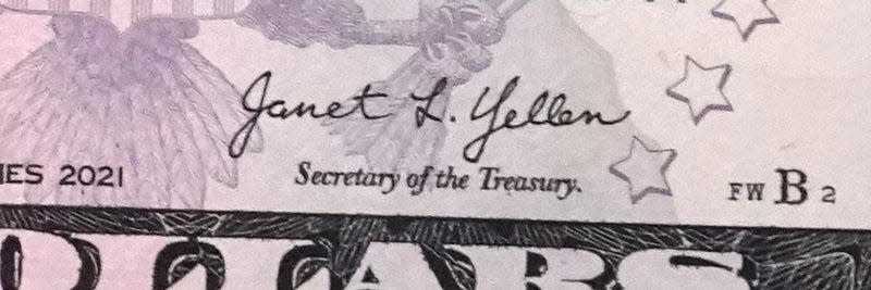 Secretary of the Treasury Janet Yellen's signature is shown on five dollar bills during a visit to the Bureau of Engraving and Printing's (BEP) Western Currency Facility in Fort Worth.
