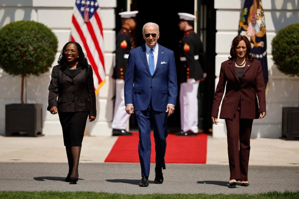 (L-R) Judge Ketanji Brown Jackson, U.S. President Joe Biden and Vice President Kamala Harris walk out of the White House for an event celebrating Jackson’s confirmation to the U.S. Supreme Court on the South Lawn on April 8, 2022, in Washington, D.C. (Photo by Chip Somodevilla/Getty Images)