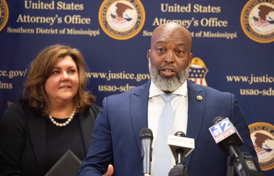 FBI Special Agent in Charge Jermicha Fomby remarks during a news conference announcing six former law enforcement officers pleaded guilty to charges related to the beating and sexual assault of two Black men. The news conference followed court hearings at the Thad Cochran United States Courthouse in Jackson, Miss., Thursday, Aug. 3, 2023. At left is Deputy Attorney General Mary Helen Wall.