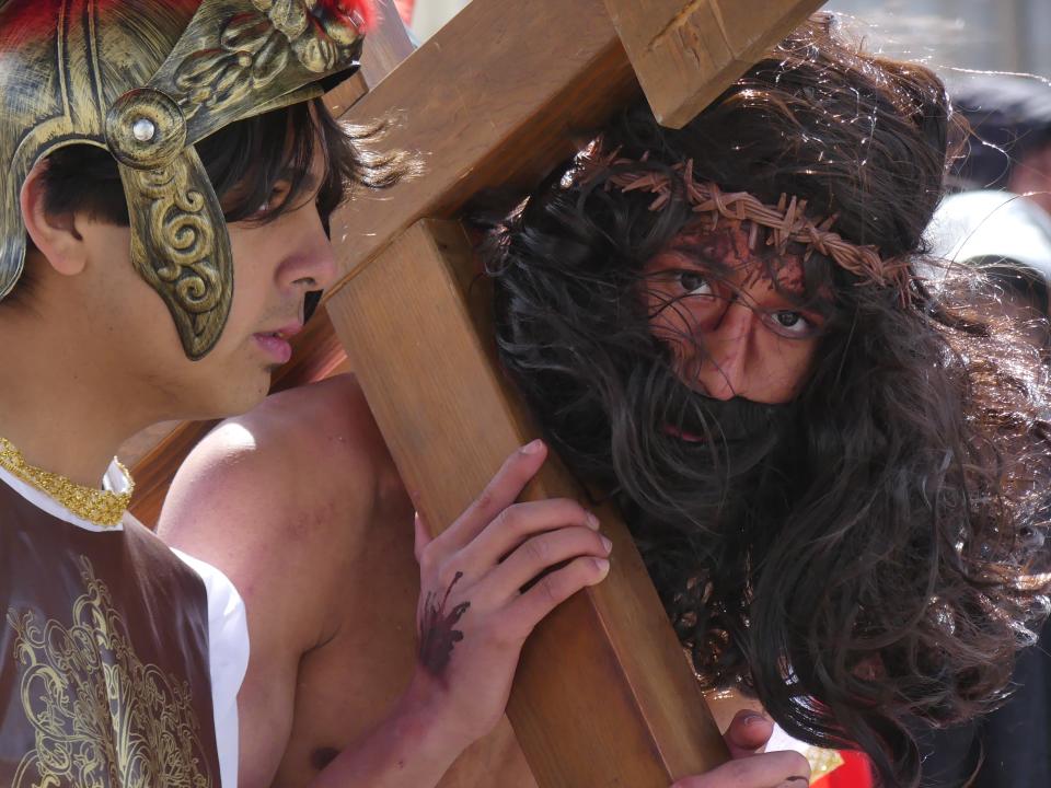 Good Friday worshippers braved the wind and cold outside of St. Joan of Arc Catholic Church in Victorville to observe and participate in a live presentation of Stations of the Cross. Jacob Patiño played the role of Jesus Christ.