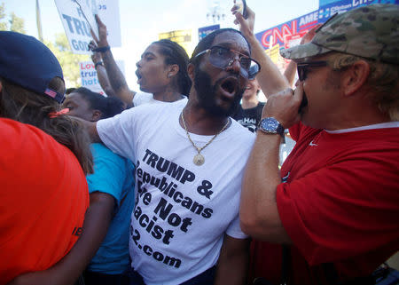 Protesters gather during demonstrations on the campus of University of Nevada, Las Vegas, before the last 2016 U.S. presidential debate in Las Vegas, Nevada, U.S., October 19, 2016. REUTERS/Jim Urquhart