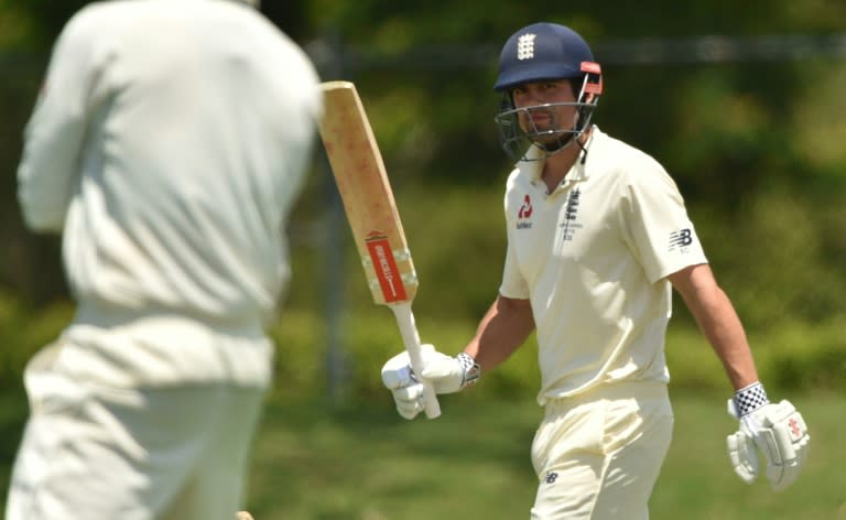 England opener Alastair Cook celebrates his 50 against Cricket Australia XI on the second day of their four-day Ashes tour match, at the Tony Ireland Stadium in Townsville, on November 16, 2017