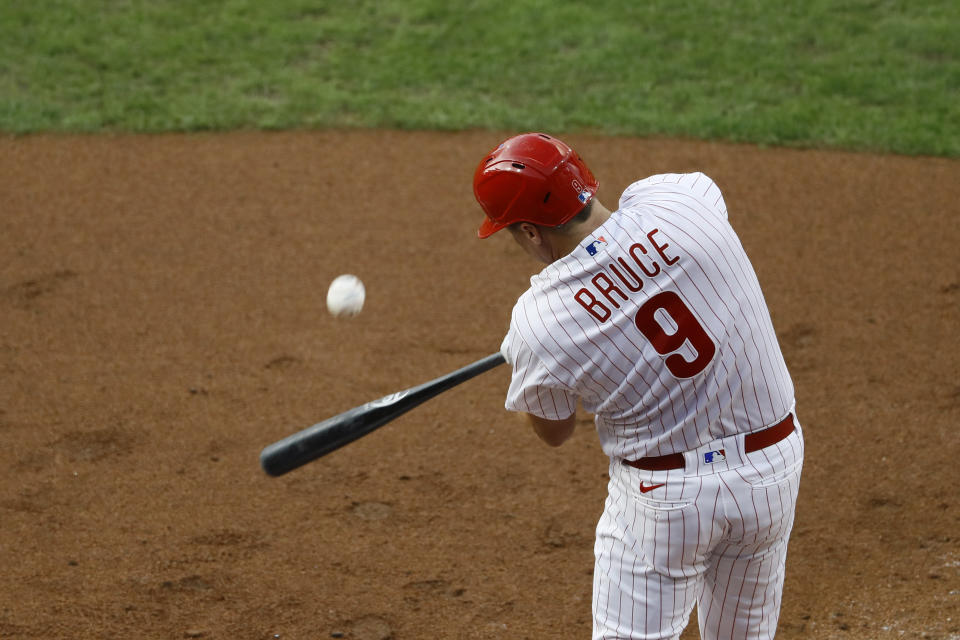 Philadelphia Phillies' Jay Bruce hits a three-run home run off Atlanta Braves starting pitcher Kyle Wright during the fourth inning of a baseball game, Saturday, Aug. 8, 2020, in Philadelphia. (AP Photo/Matt Slocum)