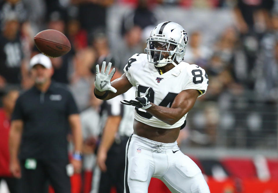 Antonio Brown ran routes and wore his full uniform -- helmet included -- before Thursday's Raiders-Cardinals game. (Reuters)