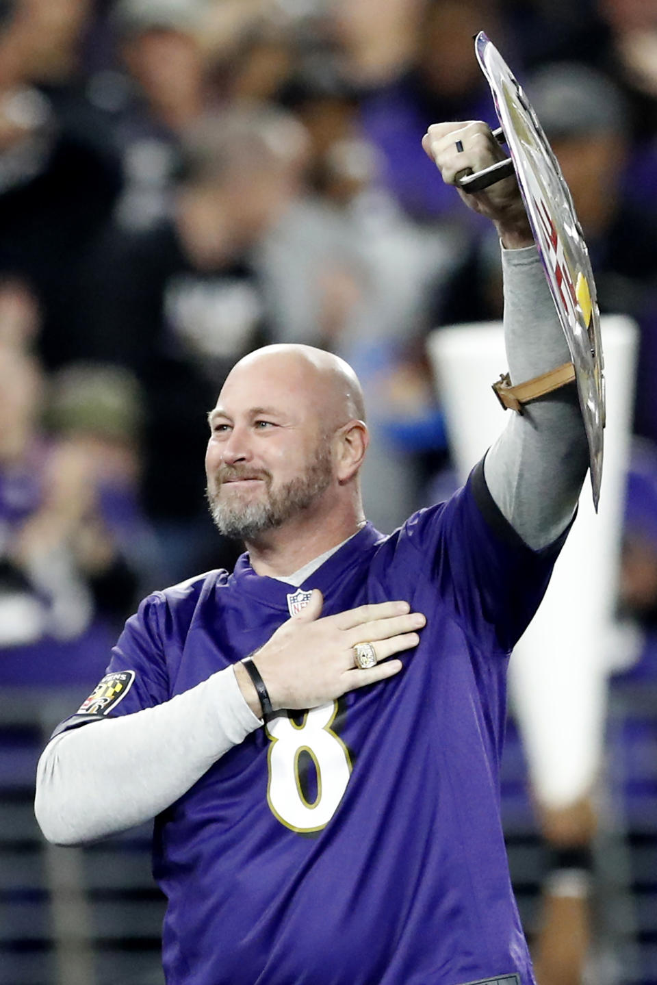 FILE - Former Baltimore Ravens quarterback Trent Dilfer is introduced on the field prior to an NFL divisional playoff football game against the Tennessee Titans, Saturday, Jan. 11, 2020, in Baltimore. Former NFL quarterback Trent Dilfer, who has been coaching a high school team in Tennessee for the last four years, is the leading candidate to become the new coach at UAB, a person with knowledge of the search told The Associated Press on Tuesday night, Nov. 29, 2022.The person spoke on condition of anonymity because UAB was not making details of its search public.(AP Photo/Julio Cortez, File)
