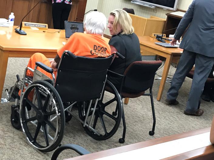 Richard G. Pierce confers with his attorney, Kate Zuidmulder, during his sentencing hearing Friday in Door County Circuit Court. Pierce, 86, was sentenced to life in prison for first-degree murder in the 1975 disappearance of his wife, Carol Jean Pierce, plus three years for moving her body.