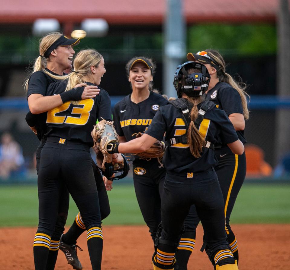 Missouri softball celebrates its 3-0 win over Tennessee in the semifinal game of the SEC Tournament on Friday at Katie Seashole Pressly Stadium in Gainesville, Fla.