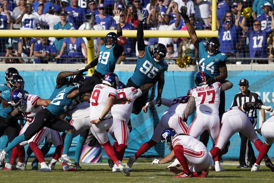 New York Giants' Graham Gano (9) kicks a field goal during the second half of an NFL football game against the Jacksonville Jaguars Sunday, Oct. 23, 2022, in Jacksonville, Fla. (AP Photo/John Raoux)