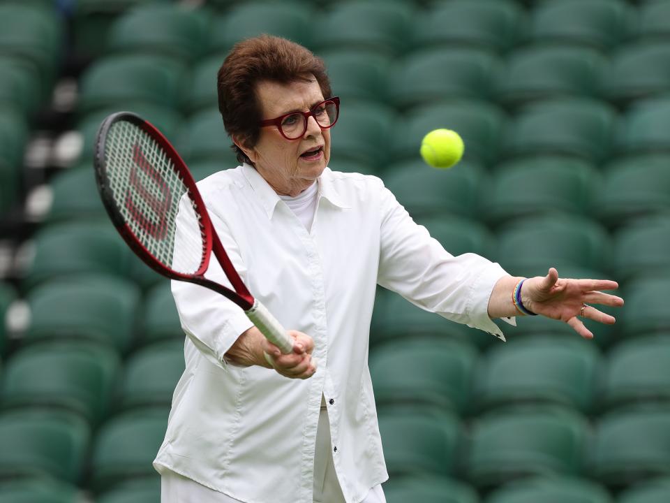 Billie Jean King plays a forehand at the All England Lawn Tennis and Croquet Club in 2023.