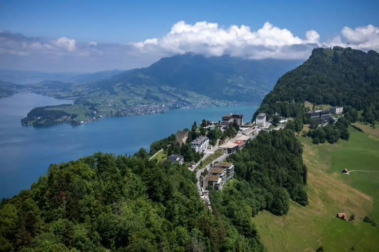 This aerial photograph taken on June 4, 2024, shows the Burgenstock resort above Lake Lucerne that will host a Ukraine peace summit on June 15-16, 2024. US Vice President Kamala Harris will travel to Switzerland for a Ukraine peace summit, officials said on June 3, 2024, with President Joe Biden opting instead to attend an election fundraiser featuring George Clooney. (Fabrice COFFRINI)