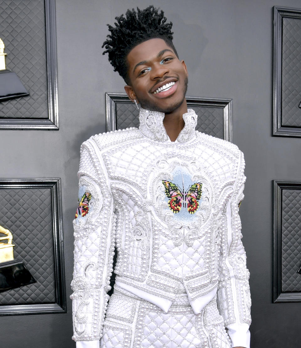 <p><em>First openly gay rap superstar </em></p> <p>Born Montero Lamar Hill, the rapper, 23, has been dismantling stereotypes and upending hip-hop tradition ever since his 2019 breakthrough single "Old Town Road" made him a star. While the song, a blend of rap and country with a hook sung by <a href="https://people.com/country/achy-breaky-heart-anniversary-history/" rel="nofollow noopener" target="_blank" data-ylk="slk:Billy Ray Cyrus;elm:context_link;itc:0;sec:content-canvas" class="link ">Billy Ray Cyrus</a>, was enjoying a 19-week run at No. 1, Nas X came out as gay on Twitter, breaking down a barrier in a genre that's been criticized for its homophobia. The Grammy winner, who hails from Lithia Springs, Georgia, has also become a style icon with his bold, colorful outfits. His A-list contacts have expanded since "Old Town Road" (he's worked with Cardi B, Nas and Jack Harlow, among others), but when Cyrus got the offer to guest on the then relatively unknown teenager's soon-to-be smash, jumping in was a no-brainer. Says Cyrus: "They said, 'When can you do it?' And I said, 'Today.' "</p>