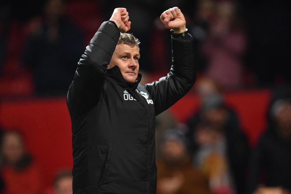 Manchester United's Norwegian manager Ole Gunnar Solskjaer celebrates on the pitch after the English Premier League football match between Manchester United and Newcastle United at Old Trafford in Manchester, north west England, on December 26, 2019. - Manchester United won the game 4-1. (Photo by Paul ELLIS / AFP) / RESTRICTED TO EDITORIAL USE. No use with unauthorized audio, video, data, fixture lists, club/league logos or 'live' services. Online in-match use limited to 120 images. An additional 40 images may be used in extra time. No video emulation. Social media in-match use limited to 120 images. An additional 40 images may be used in extra time. No use in betting publications, games or single club/league/player publications. /  (Photo by PAUL ELLIS/AFP via Getty Images)