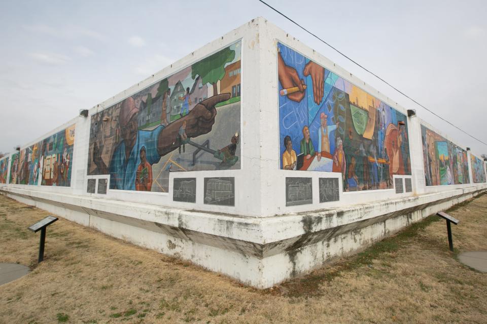 The Great Mural Wall, located just west of the Stormont Vail Events Center, features large painted panels depicting Topeka history.