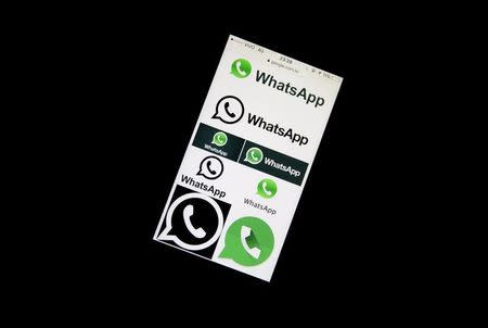 An illustration photo shows Whatsapp App logos on a mobile phone in Sao Paulo, Brazil, December 16, 2015. REUTERS/Nacho Doce