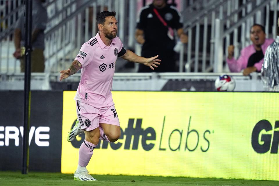 Lionel Messi celebrates after scoring one of his two goals in a 3-1 win over Orlando City in a Leagues Cup game at DRV PNK Stadium.