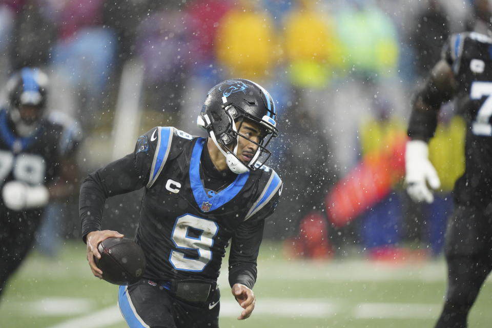 Carolina Panthers quarterback Bryce Young runs against the Atlanta Falcons during the first half of an NFL football game Sunday, Dec. 17, 2023, in Charlotte, N.C. (AP Photo/Jacob Kupferman)