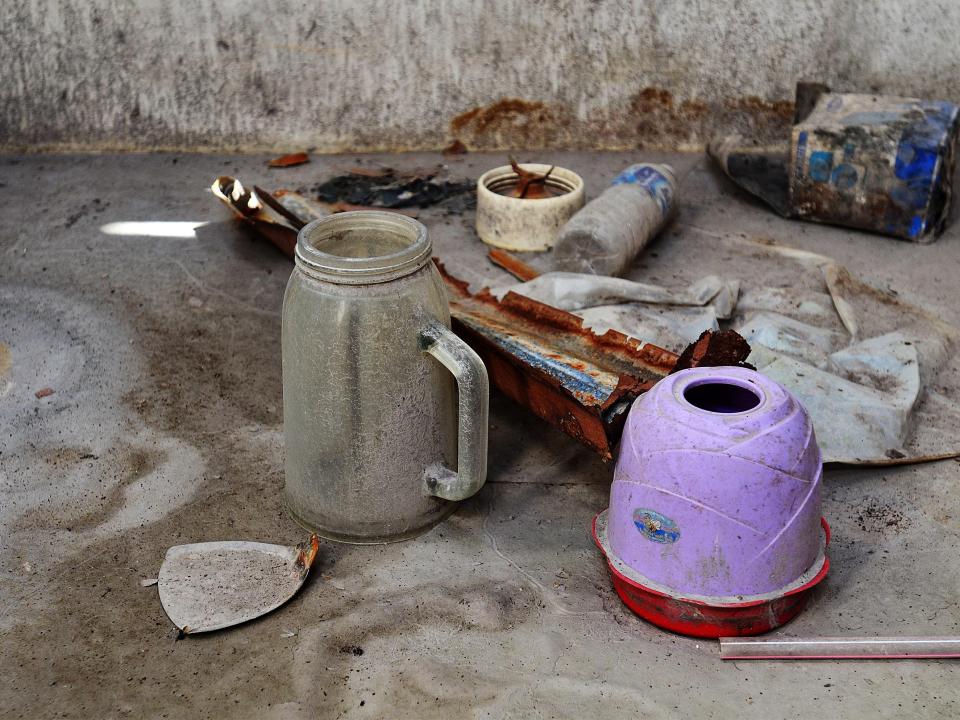 Kitchen appliances covered in ash in Karo, Indonesia.