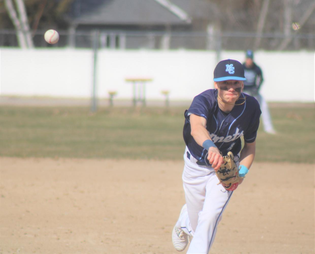 Mackinaw City's Sabastian Pierce fires a pitch during game one of a home baseball doubleheader against Boyne Falls on Tuesday.