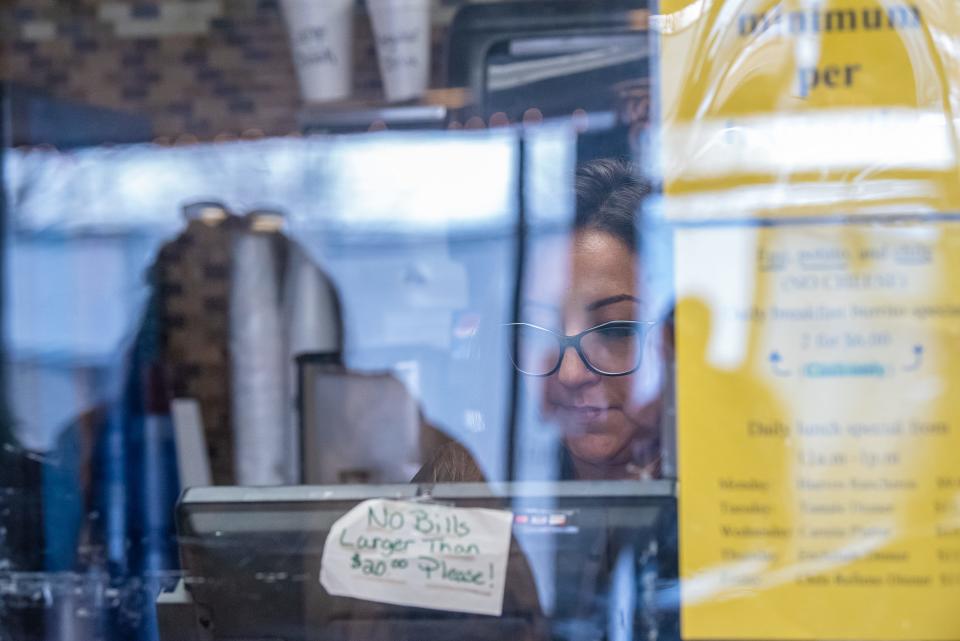 Vanessa Becerra takes a customer's order at Lupita's Mexican Restaurant on Wednesday. After 13 years overlooking City Park, Lupita's will be closing its doors in late February.